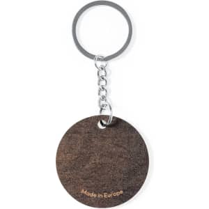 A round brown keyring with a metal chain and ring, featuring a logo.