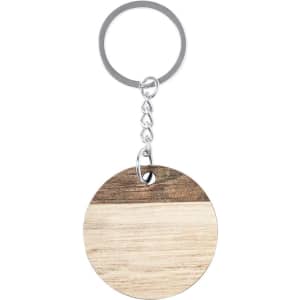 A circular keyring featuring a wood design with light and dark wood tones, attached to a silver metal chain.
