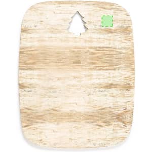 A wooden cutting board with a rustic finish and a tree-shaped cutout at the top. It has a light, natural colour.
