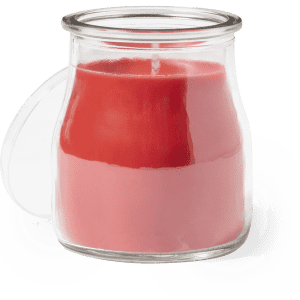A pink aromatic candle in a clear glass jar with a lid, featuring a smooth, layered design.