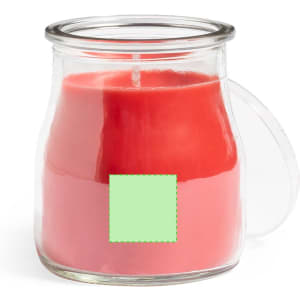 A glass jar candle featuring a layered design in red shades, with a clear lid and a simple branding label.