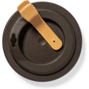 A drink lid in dark colour with a yellow tab, designed for a travel mug, featuring a logo.