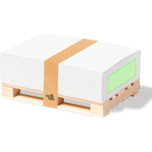A notepad with a white exterior, tied with a brown band, resting on a wooden pallet. It has a logo on the side.