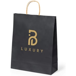 A black paper bag with a gold logo and a rope handle, designed for luxury products.