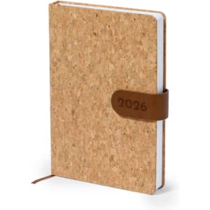 A cork-covered diary with a brown leather strap, featuring a year indicator for 2026.