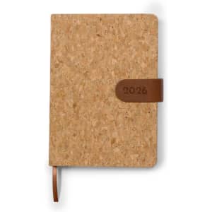 A cork-covered diary with a brown leather strap, featuring a closure and a ribbon marker.