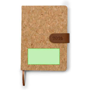 A cork diary features a brown leather strap and a blank green section for personalisation. It’s designed for 2026.