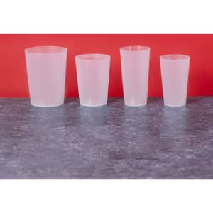 A set of four frosted plastic cups in varying sizes, displayed against a red background. Each cup has a simple design.