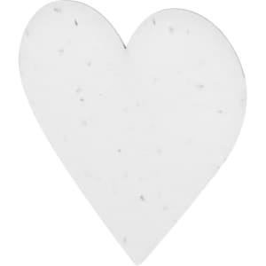 A heart-shaped piece of paper in white with speckles, designed for planting seeds.