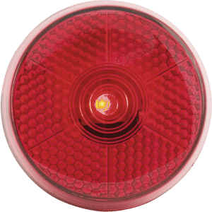 A red security light with a hexagonal pattern and a central bulb, featuring a circular design.