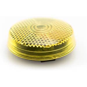 A circular yellow security light with a textured surface and a black base, featuring a logo on the bottom.