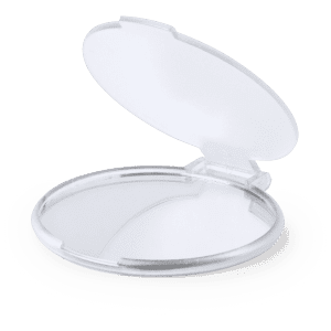 A clear, round pocket mirror with a hinged lid, open to display the reflective surface.
