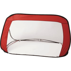 A portable pop-up goal post with a red frame and white netting, designed for outdoor sports activities.