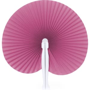 A pink paper fan with a white handle, featuring a pleated design for added texture.