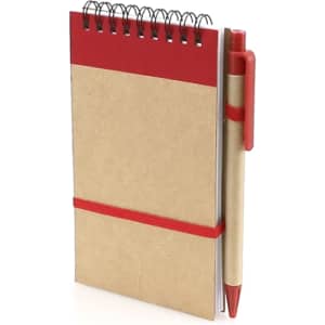 A tan notebook with a red top, spiral binding, and a matching red pen secured by a red elastic band.