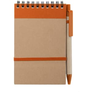 A brown notebook with an orange band and pen attached, featuring a spiral binding and a textured cover.