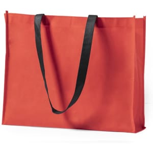 A large red tote bag with black handles and a simple design. It features a branding logo.