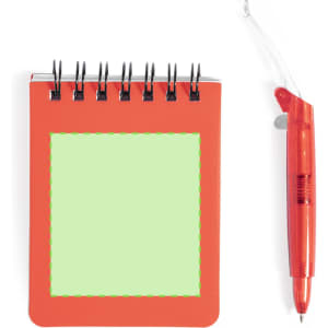 An orange mini notebook with a green interior and a spiral binding, accompanied by a red pen.