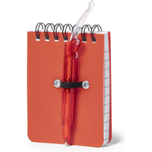 An orange mini notebook with a spiral binding, featuring a clear pen attached by a strap.