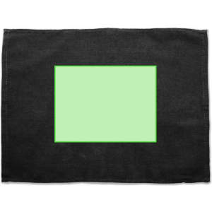A black placemat with a green rectangular centre and a subtle texture. It has a branding logo in the corner.
