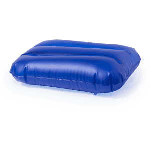 An inflatable blue pillow with a smooth surface and two raised sections. It has a logo on one side.