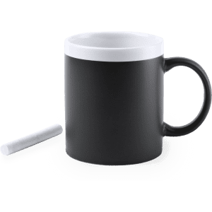 A coffee mug featuring a matte black exterior and a glossy white interior, accompanied by a piece of chalk.