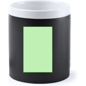 A coffee mug featuring a black exterior and a white interior, with a blank green area for custom designs.