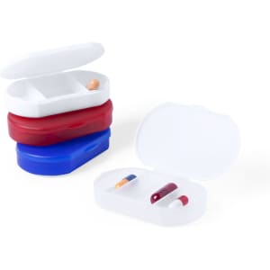 A stack of three pillboxes in red, blue, and white, with an open white box displaying compartments for tablets.