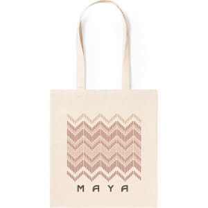 A beige tote bag featuring a zigzag design in warm tones and a logo at the bottom.