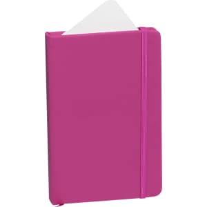 A pink Kine Notepad with an elastic band closure and a white sheet peeking out from the top.