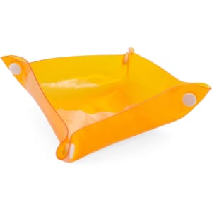 An orange Flot Coin Tray with rounded corners and snap buttons for securing its shape. It features a simple design.