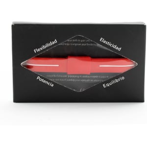 A red energy bracelet displayed in a black box with a clear window, featuring various descriptive terms around the edges.