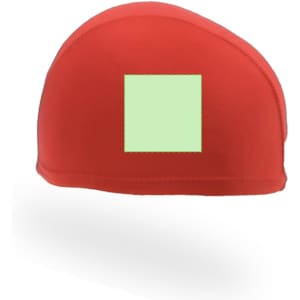 A red swim hat with a green square section, featuring a logo or branding.