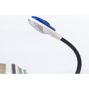 A flexible desk lamp with a blue and white design, featuring a curved neck and a light head, next to some books.
