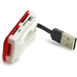 A red and white Dira Card Reader with a USB connection, designed for reading various memory cards.