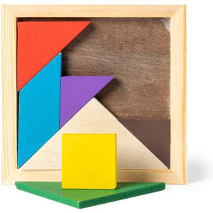 A wooden Tangram puzzle in various colours, featuring geometric pieces arranged in a square frame with a single piece separated.