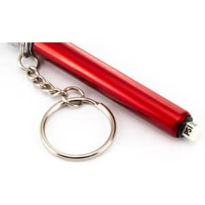 A red pressure gauge on a silver keyring. The gauge has a small white indicator at the end.