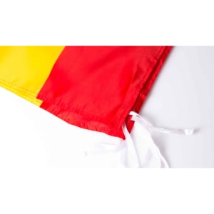 A vibrant yellow and red flag featuring white ties, designed for exhibitions and events.