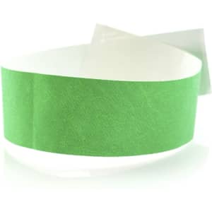 A green event wristband made from paper, featuring a peel-off adhesive backing. It has a smooth texture.