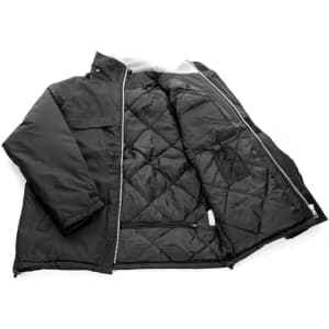 A black rain jacket laid open, featuring a quilted interior and a logo on the exterior.