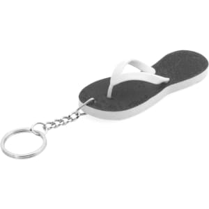 A keyring shaped like a flip-flop, featuring black and white colours with a metal chain attachment.