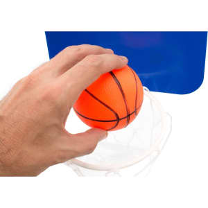 An orange basketball sits above a white hoop, with a hand reaching towards it against a blue background.