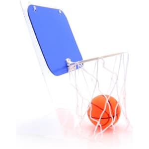 A mini basketball hoop with a blue backboard and an orange basketball resting in the net.