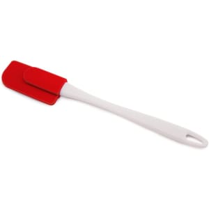 A Kerman spatula with a red silicone head and a white handle, featuring a logo on the handle.