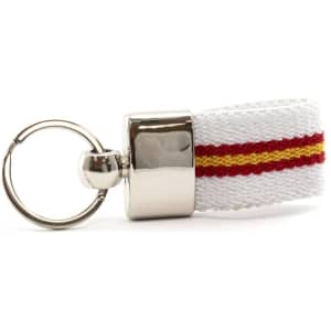 A keyring featuring a silver metal attachment and a white woven strap with red and yellow stripes.