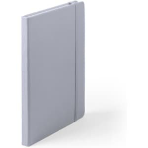 A grey notepad with a sleek design and an elastic strap. It features a simple branding logo on the cover.