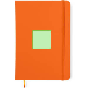An orange notepad with a green square design on the cover and an orange ribbon bookmark. Features a logo.