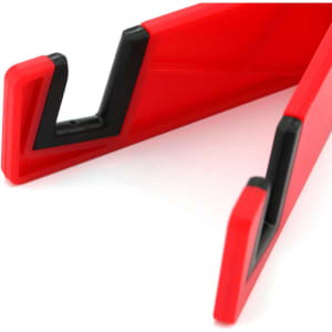 A red phone stand with black accents, featuring a unique angled design for support. Includes a logo.