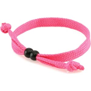 A pink braided bracelet with black beads and adjustable ties. It features a simple and casual design.