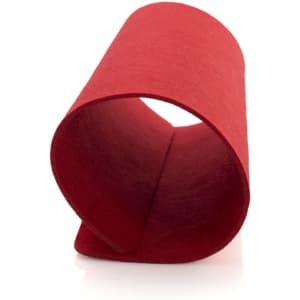 A rolled red felt placemat with smooth edges, featuring a simple design and a branded logo.